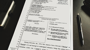 OAN Files Lawsuit Against DirecTV, AT&T, And AT&T Chairman William Kennard