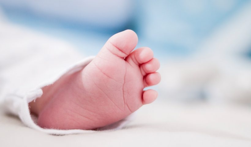 Close-Up Photography a Baby's Left Foot. Photo by Dominika Roseclay
