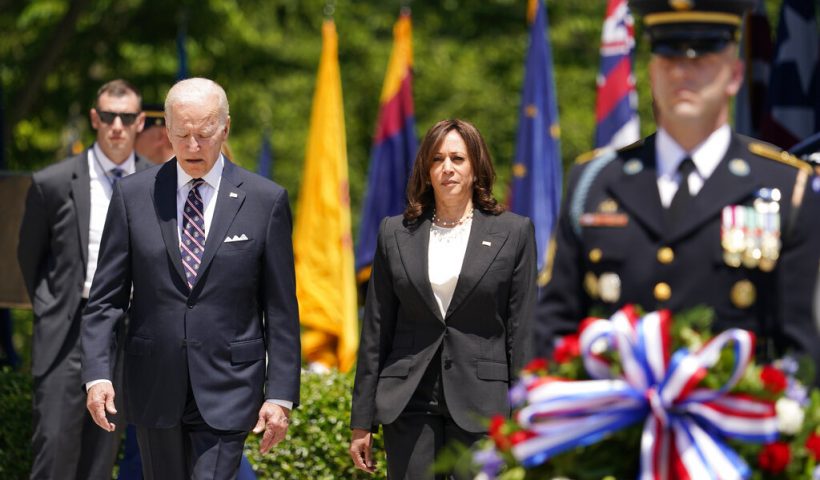 President Joe Biden and Vice President Kamala Harris arrive to lay a wreath at The Tomb of the Unknown Soldier at Arlington National Cemetery on Memorial Day, Monday, May 30, 2022, in Arlington, Va. (AP Photo/Andrew Harnik)
