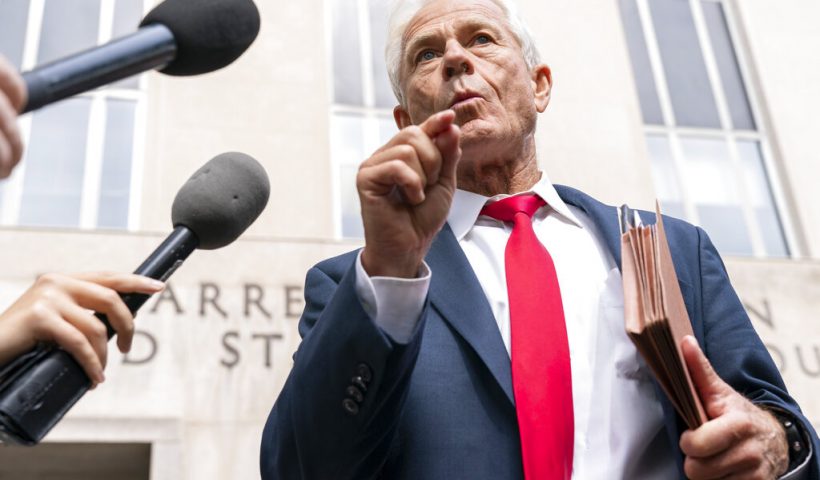 Former Trump White House official Peter Navarro speaks to reporters Friday, June 3, 2022, outside of federal court in Washington. Navarro was indicted Friday on contempt charges after defying a subpoena from the House panel investigating the Jan. 6 attack on the U.S. Capitol. (AP Photo/Jacquelyn Martin)