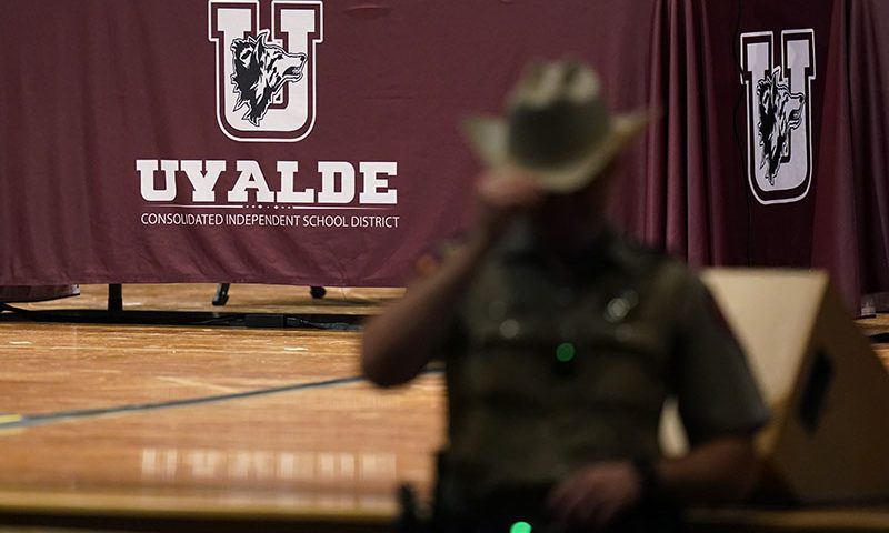 Texas Department of Safety Troopers stand by for a meeting of the Board of Trustees of Uvalde Consolidated Independent School District, Wednesday, Aug. 24, 2022, in Uvalde, Texas. The board is expected to hold termination hearings to decide the employment fate of Uvalde School District Police Chief Pete Arredondo. (AP Photo/Eric Gay)