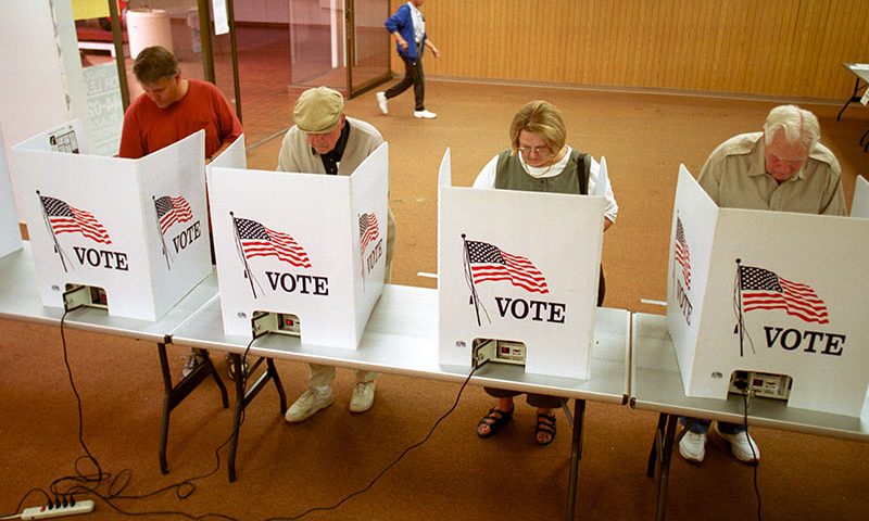 380728 03: Residents of El Paso, Texas cast their ballot for president of the United States in early voting, October 23, 2000. The state of Texas has early voting that must be conducted for all elections. In most elections, early voting by personal appearance begins on the 17th day before Election Day and ends on the 4th day before Election Day. (Photo by Joe Raedle/Newsmakers)