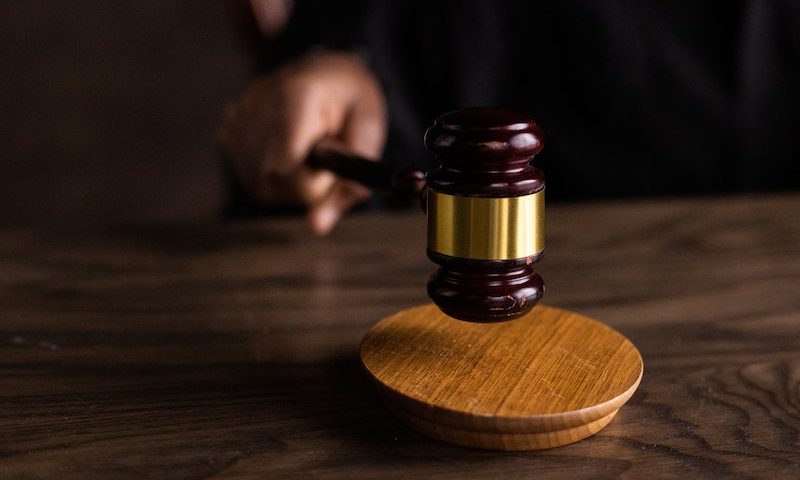 Brown Wooden Gavel on Brown Wooden Table. Photo by EKATERINA BOLOVTSOVA