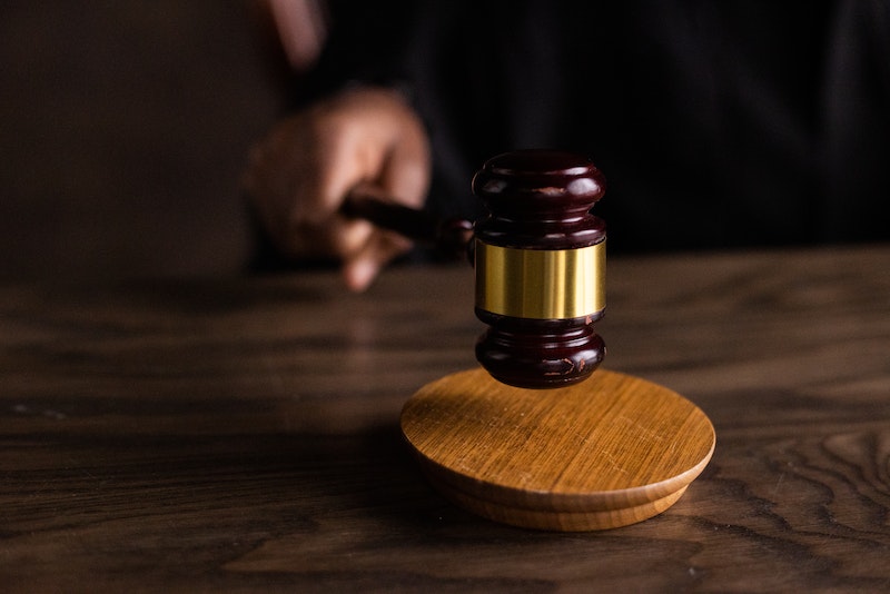 Brown Wooden Gavel on Brown Wooden Table. Photo by EKATERINA BOLOVTSOVA