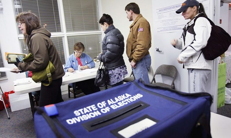 ANCHORAGE, AK - NOVEMBER 02: Alaskan voters line up to receive their ballots at a polling station on November 2, 2010 in Anchorage, Alaska. Voters in Anchorage braved the season's first snowstorm to choose their candidate in a three-way race for Alaska's Senate seat, one of the most closely-watched races in the country. (Photo by John Moore/Getty Images)