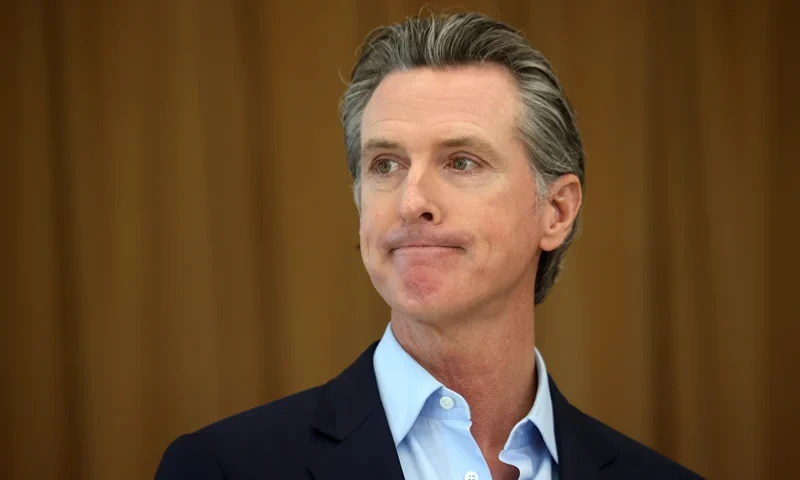 ALAMEDA, CALIFORNIA - MARCH 16: California Gov. Gavin Newsom looks on during a news conference after he toured the newly reopened Ruby Bridges Elementary School on March 16, 2021 in Alameda, California. Gov. Newsom is traveling throughout California to highlight the state's efforts to reopen schools and businesses as he faces the threat of recall. (Photo by Justin Sullivan/Getty Images)