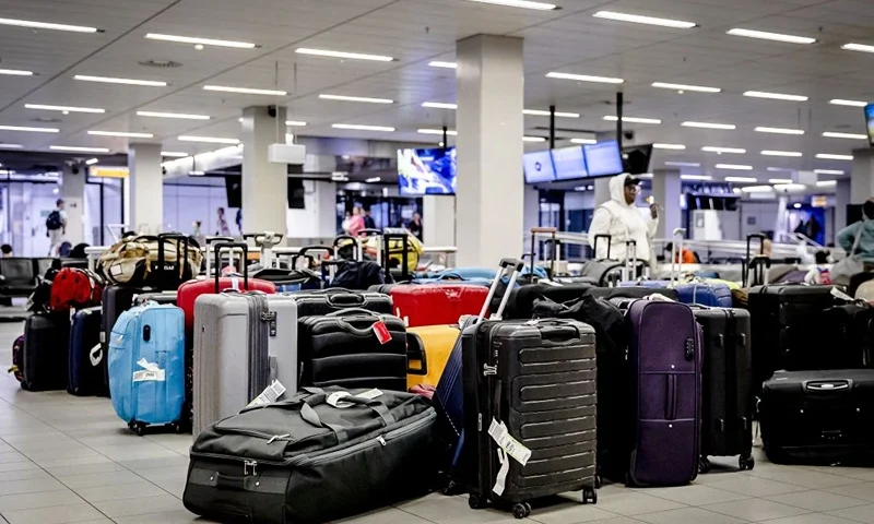 This photograph taken on July 26, 2022 shows suitcases at the baggage claim service at Schiphol Airport in Amsterdam. - Due to staff shortages, crowds and many missed flights, thousands of suitcases are waiting at the baggage claim service. (Photo by Remko de Waal / ANP / AFP) / Netherlands OUT (Photo by REMKO DE WAAL/ANP/AFP via Getty Images)