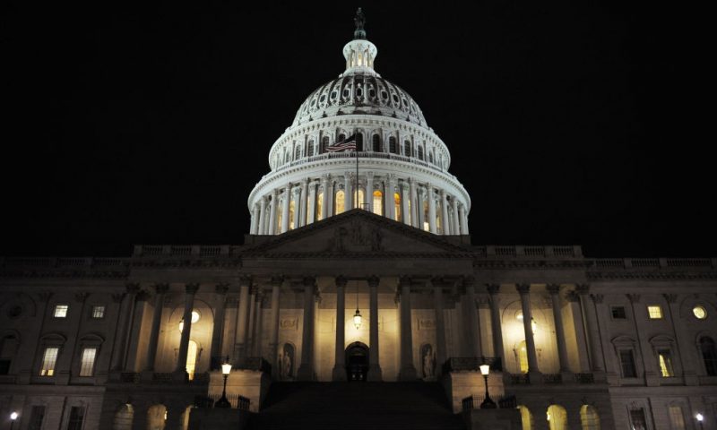 The dome of the Capitol is lit up October 1, 2008 as the Senate was set to vote on a 700-billion-dollar bailout package in Washington, DC. The US Senate on Wednesday approved a 700-billion-dollar Wall Street bailout package by a vote of 74-25 amid a widening global crisis sparked by the collapse of the US housing market. AFP PHOTO/Mandel NGAN (Photo by Mandel NGAN / AFP) (Photo by MANDEL NGAN/AFP via Getty Images)
