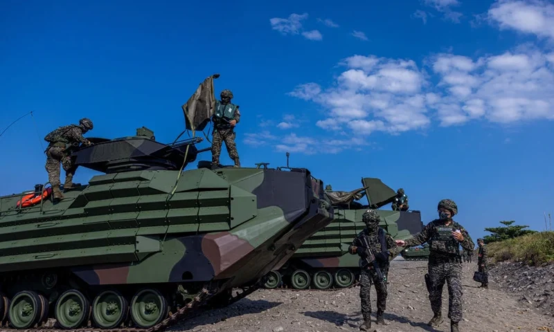 Soldiers prepare AAV7 amphibious assault vehicles after an amphibious landing drill during the Han Kuang military exercise, which simulates China's People's Liberation Army (PLA) invading the island, on July 28, 2022 in Pingtung, Taiwan. Taiwan military launches five days of live fire drills involving all forces of the military to repel simulated attacks from China. (Photo by Annabelle Chih/Getty Images)