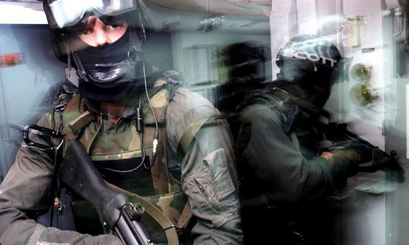 394667 02: (File Photo) U.S. Navy Seals Conduct Room Search And Clearing Operations During A Practice Excersize July 21, 2000 In The Red Sea. The U.S. Military Is Gearing-Up For Strikes Against Terrorist Sites September 19, 2001 In Response To The Recent Terrorist Attacks On New York City And Washington Dc. (Photo By Dod/Getty Images)