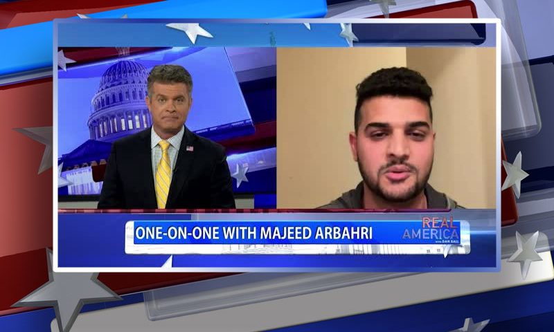 Video still from Majeed Arbahri's interview with Real America on One America News Network