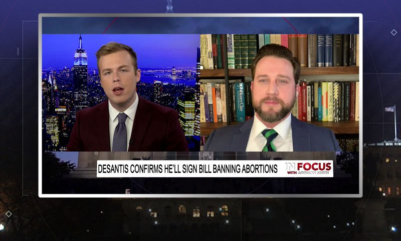 Video still from William Wolfe's interview with In Focus on One America News Network