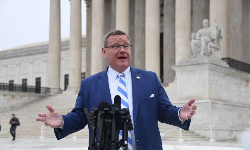 Republican speaker of the North Carolina House of Representatives, Tim Moore, speaks to the press in front of the US Supreme Court in Washington, DC, on December 7, 2022. - The US Supreme Court hears arguments in Moore v. Harper, a case brought by North Carolina Republicans led by Moore and which could fundamentally alter the way democracy operates in America, by expanding the power of state legislatures over elections for the White House and Congress. (Photo by OLIVIER DOULIERY / AFP) (Photo by OLIVIER DOULIERY/AFP via Getty Images)