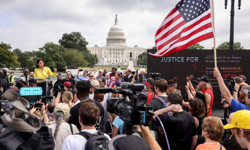 WASHINGTON, DC - SEPTEMBER 18: Supporters of those charged in the January 6 attack on the U.S. Capitol attend the 'Justice for J6' rally near the U.S. Capitol September 18, 2021 in Washington, DC. The protestors gathered in Washington, DC on Saturday to support over 600 people arrested and charged in connection with the January 6 attempted insurrection at the U.S. Capitol. (Photo by Tasos Katopodis/Getty Images)