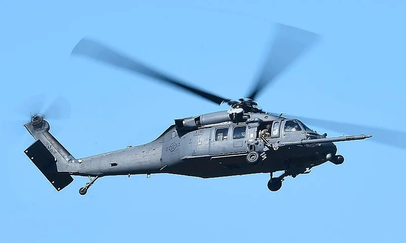 A U.S military HH-60 Pave Hawk Helicopter is seen flying over a simulated crash site during Exercise Angel Reign on July 1, 2016 in Townsville, Australia. Exercise Angel Reign is the largest Air Force led field exercise in Australia this year and is a bilateral Joint Personnel Recovery exercise which aims to practice search and rescue activities both at sea and on land. (Photo by Ian Hitchcock/Getty Images)