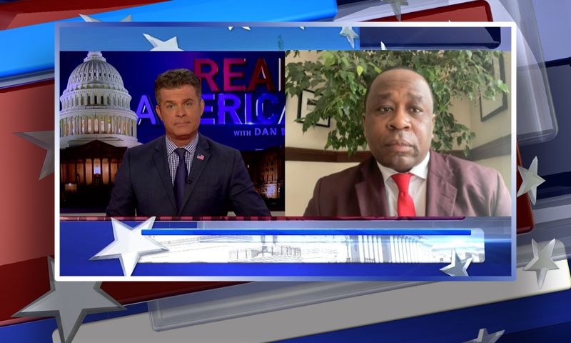 Video still from Simon Ateba's interview with Real America on One America News Network