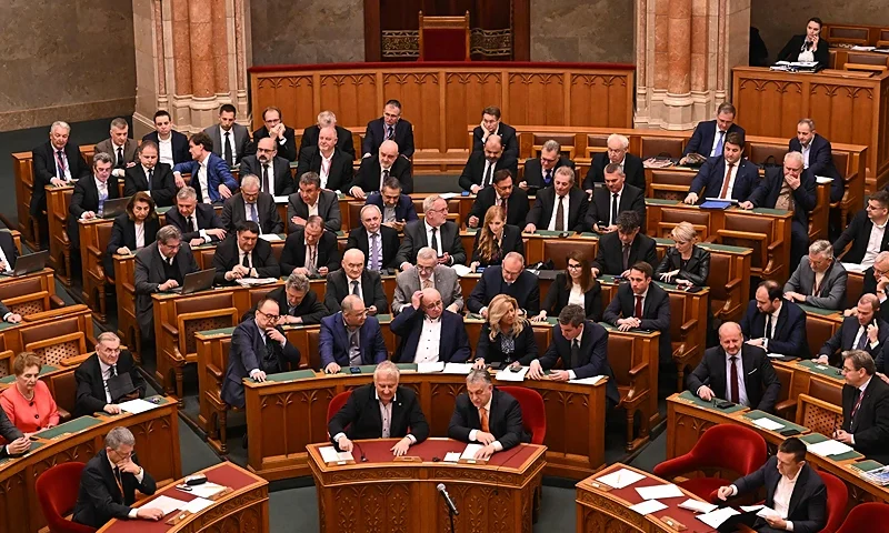 Hungarian Prime Minister Viktor Orban (front R) and deputy prime minister Zsolt Semjen (front L) attend the parliamenary session as the representatives of the Hungarian Parliament vote about Finland's NATO accession, in the main hall of the parliament building in Budapest on March 27, 2023. (Photo by ATTILA KISBENEDEK/AFP via Getty Images)