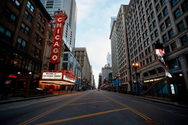 Chicago Theatre is seen in Chicago, Illinois, on March 21, 2020. - Almost one billion people were confined to their homes worldwide Saturday as the global coronavirus death toll topped 12,000 and US states rolled out stay-at-home measures already imposed across swathes of Europe. More than a third of Americans were adjusting to life in various phases of virtual lockdown -- including in the US's three biggest cities of New York, Los Angeles and Chicago -- with more states expected to ramp up restrictions. (Photo by KAMIL KRZACZYNSKI / AFP) (Photo by KAMIL KRZACZYNSKI/AFP via Getty Images)