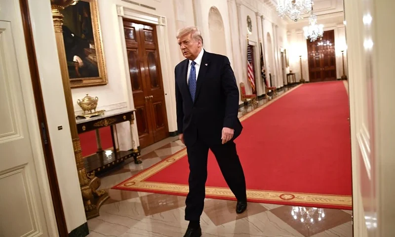 US President Donald Trump arrives to deliver remarks on "Operation Legend: Combating Violent Crime in American Cities" in the East Room of the White House, Washington, DC, on July 22, 2020. (Photo by Brendan Smialowski / AFP) (Photo by BRENDAN SMIALOWSKI/AFP via Getty Images)
