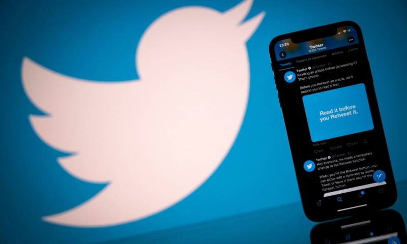 TOPSHOT - This photograph taken on October 26, 2020 shows the logo of US social network Twitter displayed on the screen of a smartphone and a tablet in Toulouse, southern France. (Photo by Lionel BONAVENTURE / AFP) (Photo by LIONEL BONAVENTURE/AFP via Getty Images)