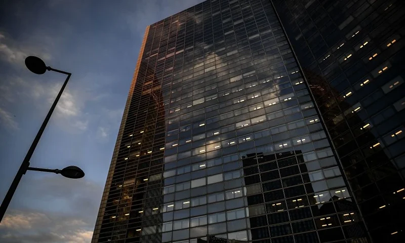 High-rise buildings are pictured at the business district of La Defense west of Paris on October 21, 2020, as the country faces a new wave of infections to the Covid-19 (the novel coronavirus). - La Defense, the largest European business district and the fourth largest in the world, had to reshape its activity following the Covid-19 pandemic: work from home, barrier measures and safety guidelines. According to Paris-La Defense association district, 60% of its workers have returned to the office. However, following the lockdown, the generalisation of home working, the partial closure of bars and restaurants and, now, the curfew, the daily life of some 500 companies and 180,000 employees is permanently affected. (Photo by Christophe ARCHAMBAULT / AFP) (Photo by CHRISTOPHE ARCHAMBAULT/AFP via Getty Images)