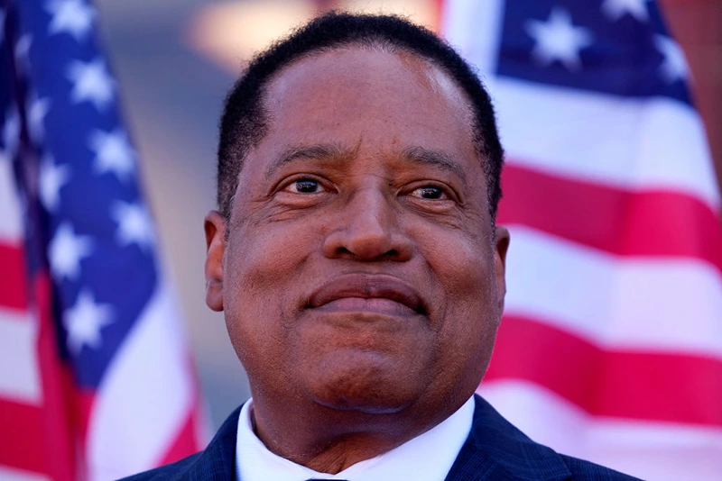 Republican gubernatorial candidate Larry Elder speaks to supporters during an Asian Rally for Yes Recall at the Asian Garden Mall in Little Saigon, Westminster, California, on September 4, 2021 - The recall election, which will be held on September 14, 2021, asks voters to respond two questions: whether Newsom, a Democratic, should be recalled from the office of governor, and who should succeed Newsom if he is recalled. Forty-six candidates, including nine Democrats and 24 Republicans, are looking to take Newsom's place as the governmental leader of California. (Photo by RINGO CHIU / AFP) (Photo by RINGO CHIU/AFP via Getty Images)