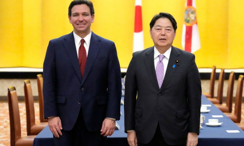 Florida Governor Ron DeSantis (L) and Japanese Foreign Minister Yoshimasa Hayashi (R) pose for photographers before their meeting at the Iikura Guest House in Tokyo on April 24, 2023. (Photo by Eugene Hoshiko / POOL / AFP) (Photo by EUGENE HOSHIKO/POOL/AFP via Getty Images)