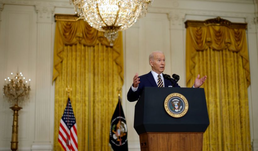 WASHINGTON, DC - JANUARY 19: U.S. President Joe Biden talks to reporters during a news conference in the East Room of the White House on January 19, 2022 in Washington, DC. With his approval rating hovering around 42 percent, Biden is approaching the end of his first year in the Oval Office with inflation soaring, COVID-19 raging and his legislative agenda stalled on Capitol Hill. (Photo by Chip Somodevilla/Getty Images)