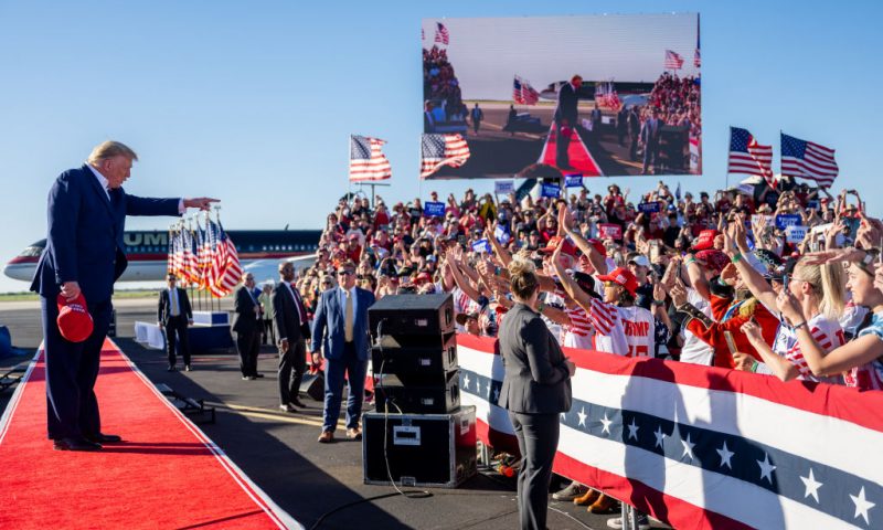 WACO, TEXAS - MARCH 25: Former U.S. President Donald Trump arrives during a rally at the Waco Regional Airport on March 25, 2023 in Waco, Texas. Former U.S. president Donald Trump attended and spoke at his first rally since announcing his 2024 presidential campaign. Today in Waco also marks the 30 year anniversary of the weeks deadly standoff involving Branch Davidians and federal law enforcement. 82 Davidians were killed, and four agents left dead. (Photo by Brandon Bell/Getty Images)