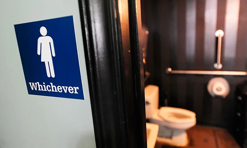 DURHAM, NC - MAY 11: A gender neutral sign is posted outside a bathrooms at Oval Park Grill on May 11, 2016 in Durham, North Carolina. Debate over transgender bathroom access spreads nationwide as the U.S. Department of Justice countersues North Carolina Governor Pat McCrory from enforcing the provisions of House Bill 2 (HB2) that dictate what bathrooms transgender individuals can use. (Photo by Sara D. Davis/Getty Images)
