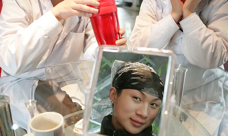 CHENGDU, CHINA - DECEMBER 10: (CHINA OUT) Transsexual patient Li Xiao, attends a press conference before a plastic surgery operation on mandible, part of his sex reassignment surgery December 10, 2005 in Chengdu of Sichuan Province, China. Chinese society has become more tolerant towards transsexualism over the past 18 years, since the first sex change operation in China in 1986. (Photo by China Photos/Getty Images)
