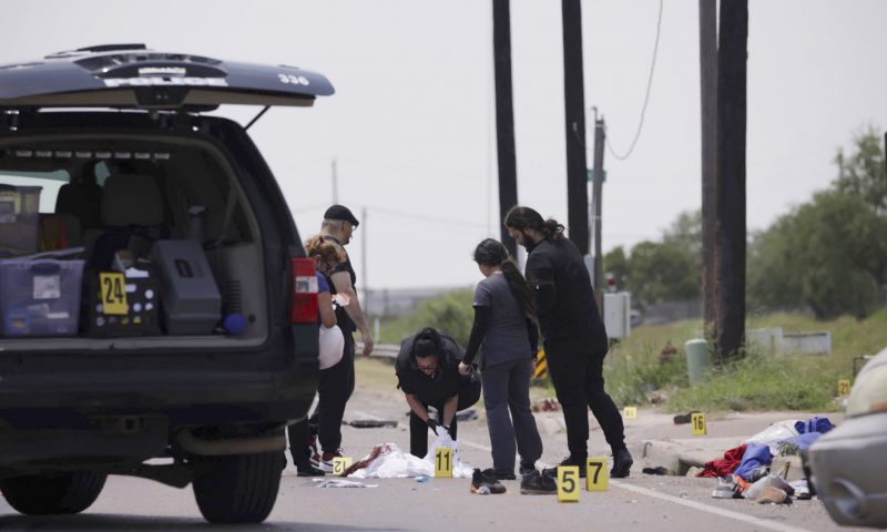Emergency personnel respond to a fatal collision in Brownsville, Texas, on Sunday, May 7, 2023. Several migrants were killed after they were struck by a vehicle while waiting at a bus stop near Ozanam Center, a migrant and homeless shelter. (AP Photo/Michael Gonzalez)
