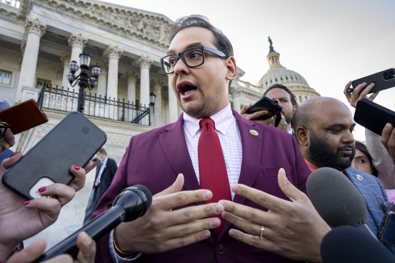 Rep. George Santos, R-N.Y., speaks to reporters outside after an effort to expel him from the House, at the Capitol in Washington, Wednesday, May 17, 2023. The freshman congressman has been charged with embezzling money from his campaign, falsely receiving unemployment funds and lying to Congress about his finances. He has denied the charges and has pleaded not guilty. (AP Photo/J. Scott Applewhite)