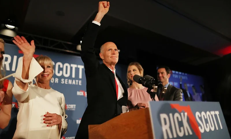 NAPLES, FLORIDA - NOVEMBER 06: Florida Governor Rick Scott and his wife, Ann Scott, along with their family take to the stage during his election night party at the LaPlaya Beach & Golf Resort on November 06, 2018 in Naples, Florida. Governor Scott defeated Sen. Bill Nelson for the Florida Senate seat. (Photo by Joe Raedle/Getty Images)