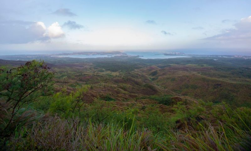 A distant view of Naval Base Guam and Apra Harbor amid the coronavirus pandemic on Monday, April 27, 2020. - At least 955 crew members aboard the USS Theodore Roosevelt have tested positive for COVID-19, according to the Navy. (Photo by Tony AZIOS / AFP) (Photo by TONY AZIOS/AFP via Getty Images)