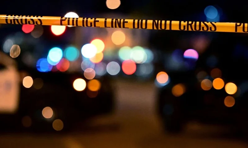 Police tape is pictured at the scene near the intersection of Garvey and Garfield Avenue in Monterey Park, California, on January 22, 2023, where police are responding to reports of multiple people shot. - Police were at the scene of a shooting in southern California that has caused a number of casualties, the Los Angeles Times reported January 22, citing a law enforcement source. (Photo by Frederic J. BROWN / AFP) (Photo by FREDERIC J. BROWN/AFP via Getty Images)