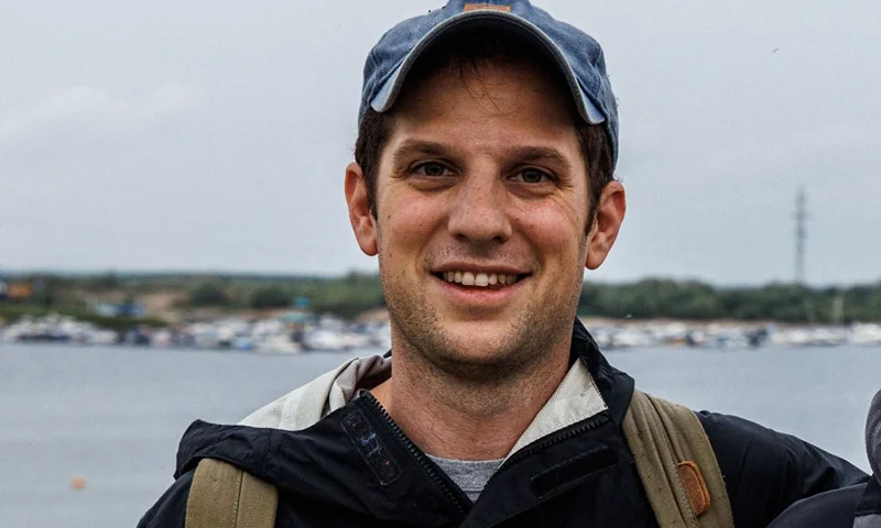 A picture taken on July 24, 2021 shows journalist Evan Gershkovich. - A US reporter for The Wall Street Journal newspaper has been detained in Russia for espionage, Russian news agencies reported Thursday, citing the FSB security services. "The FSB halted the illegal activities of US citizen Evan Gershkovich... a correspondent of the Moscow bureau of the American newspaper The Wall Street Journal, accredited with the Russian foreign ministry," the FSB was quoted as saying. He is "suspected of spying in the interests of the American government" and of collecting information "on an enterprise of the Russian military-industrial complex," agencies reported. (Photo by Dimitar DILKOFF / AFP) (Photo by DIMITAR DILKOFF/AFP via Getty Images)
