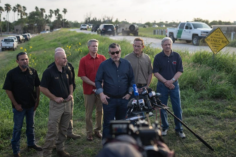 US Senator Ted Cruz (R-TX) (2L) walks to a press conference on the migrant situation on May 11, 2023 in Brownsville, Texas. The US on May 11, 2023, will officially end its 40-month Covid-19 emergency, also discarding the Title 42 law, a tool that has been used to prevent millions of migrants from entering the country. (Photo by ANDREW CABALLERO-REYNOLDS / AFP) (Photo by ANDREW CABALLERO-REYNOLDS/AFP via Getty Images)