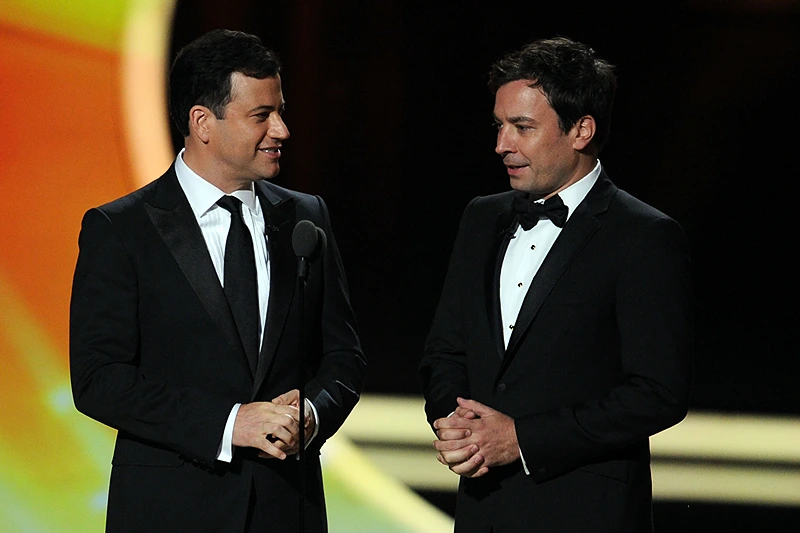 LOS ANGELES, CA - SEPTEMBER 18: TV show host's Jimmy Kimmel (L) and Jimmy Fallon speak onstage during the 63rd Annual Primetime Emmy Awards held at Nokia Theatre L.A. LIVE on September 18, 2011 in Los Angeles, California. (Photo by Kevin Winter/Getty Images)