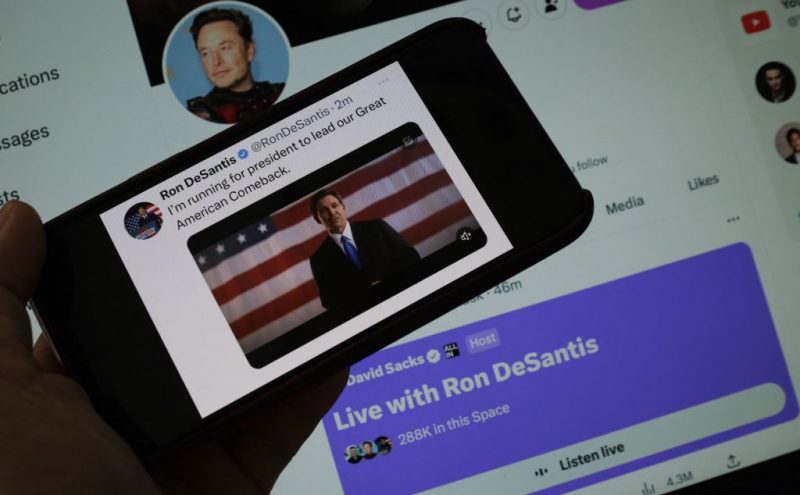 This illustration photo shows the Twitter page of Ron DeSantis as he announces his 2024 presidential run with a background of the live Twitter talk with Elon Musk on May 24, 2023 in Los Angeles, California. Republican Ron DeSantis kicked off his 2024 presidential campaign May 24, 2023 with a live event opposite Twitter boss Elon Musk that descended into farce as it was beset by technical bugs. (Photo by Chris DELMAS / AFP) (Photo by CHRIS DELMAS/AFP via Getty Images)