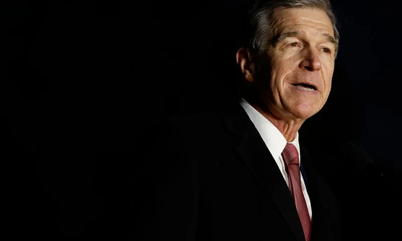 WASHINGTON, DC - NOVEMBER 29: North Carolina Governor Roy Cooper speaks during the lighting ceremony for the U.S. Capitol Christmas Tree on the West Lawn on November 29, 2022 in Washington, DC. The 79-foot-tall red spruce, nickname "Ruby," was cut from the Pisgah National Forest near Lake Toxaway, North Carolina, and is decorated with 12,000 ornaments from 125 communities in 13 different states across the country. (Photo by Chip Somodevilla/Getty Images)