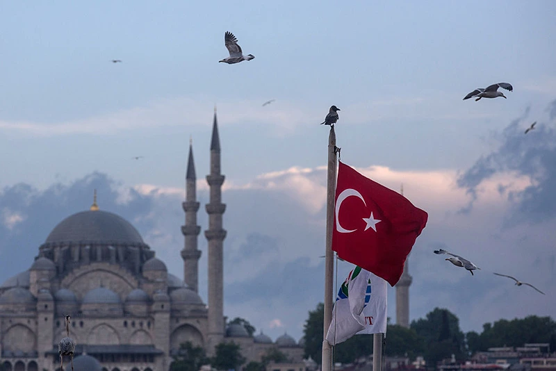 Seagulls fly over a Turkish flag on May 3, 2016 in Istanbul Turkey. The European Commission is expected to recommend granting Turks with visa free travel in Europe's Schengen area, as part of the EU-Turkey migrant deal on Wednesday. EU member states and the European Parliament are set to vote on the visa deal in June, which could see visa free travel granted to Turkish citizens as early as the end of June. (Photo by Chris McGrath/Getty Images)