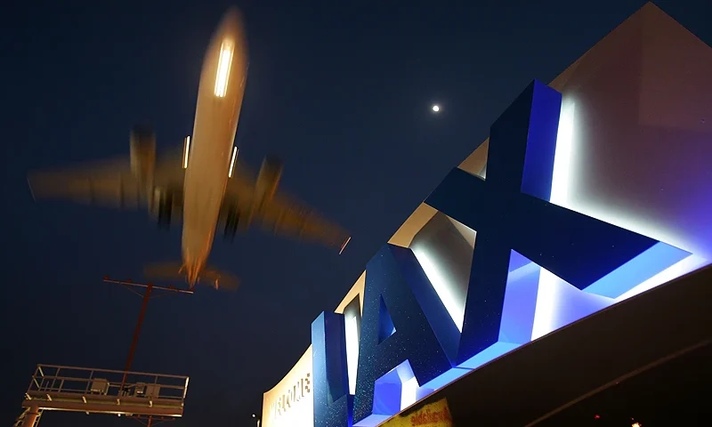LOS ANGELES, CA - APRIL 15: A jet comes in for landing at Los Angeles International Airport (LAX) on April 15, 2008 in Los Angeles, California. With skyrocketing fuel prices and a weak economy, US airlines are turning to mergers which could ultimately lead to higher fares through reduced flights and increased market power. US carriers emerged from a five-year slump in 2006 but with $35 billion in losses. In the latest merger move to save profits, Delta Air Lines Inc will buy Northwest Airlines Corp for more than $3 billion, creating the world's biggest airline. Recent profit challenges to the industry have lead to the shutdown of ATA, Skybus, and Aloha Airlines as well as bankruptcy for Frontier Airlines. (Photo by David McNew/Getty Images)