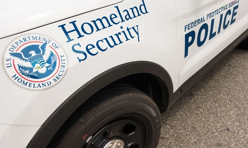 A patrol car with the Department of Homeland Security logo blocks the street outside the Department of Veterans Affairs, July 27, 2017, in Washington, DC. (Photo by Paul J. RICHARDS / AFP) (Photo by PAUL J. RICHARDS/AFP via Getty Images)
