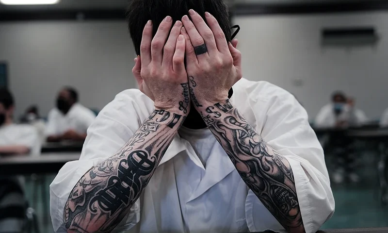 CLEVELAND, MISSISSIPPI - APRIL 28: A prisoner waits at the Bolivar County Correctional Facility to receive a Covid-19 vaccination administered by medical workers with Delta Health Center on April 28, 2021 in Cleveland, Mississippi. The prisoners, part of a population particularly vulnerable to Covid-19, are given a choice between the one-shot Johnson & Johnson vaccine and the Moderna. So far, an estimated 23 percent of Mississippians are fully vaccinated, and the Mississippi State Department of Health has reported a total of 334 new cases as of April 27. (Photo by Spencer Platt/Getty Images)