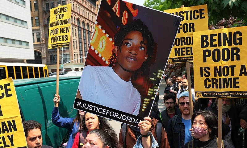NEW YORK, NEW YORK - MAY 24: NYPD Supporters of Jordan Neely protest a rally in support of Daniel Penny at Collect Pond Park on May 24, 2023 in New York City. Nassau County Executive Bruce A Blakeman was joined by military veterans as he organized a rally in support of Daniel Penny that was protested by supporters of Jordan Neely, leading to three arrest. Neely, whose funeral was held on May 19, was killed on May 1st after being placed in a chokehold by Penny at the Broadway-Lafayette subway station. Penny has been charged with 2nd Degree Manslaughter in Neely's death. (Photo by Michael M. Santiago/Getty Images)