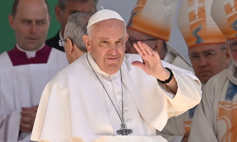 TOPSHOT - Pope Francis waves as he celebrates a holy mass at Kossuth Lajos' Square during his visit in Budapest on April 30, 2023, the last day of his tree-day trip to Hungary. (Photo by ATTILA KISBENEDEK/AFP via Getty Images)