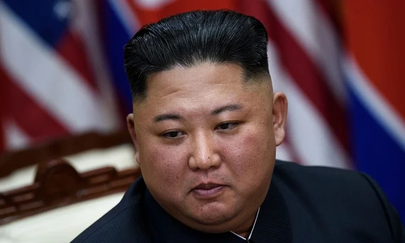 TOPSHOT - North Korea's leader Kim Jong Un before a meeting with US President Donald Trump on the south side of the Military Demarcation Line that divides North and South Korea, in the Joint Security Area (JSA) of Panmunjom in the Demilitarized zone (DMZ) on June 30, 2019. (Photo by Brendan Smialowski / AFP) (Photo credit should read BRENDAN SMIALOWSKI/AFP via Getty Images)
