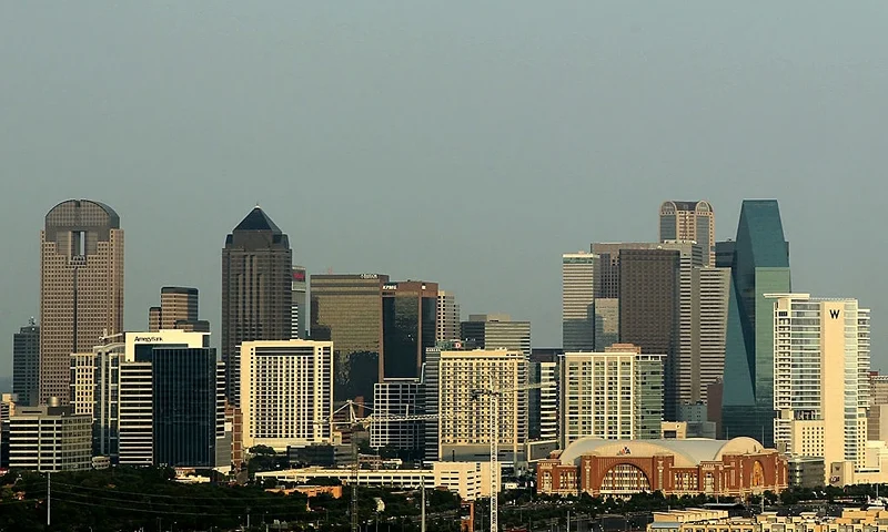 DALLAS, TX - JUNE 07: A general view of the skyline of downtown Dallas, Texas as the American Airlines Center can be seen before Game Four of the 2011 NBA Finals on June 7, 2011 in Dallas, Texas. NOTE TO USER: User expressly acknowledges and agrees that, by downloading and/or using this Photograph, user is consenting to the terms and conditions of the Getty Images License Agreement (Photo by Mike Ehrmann/Getty Images)