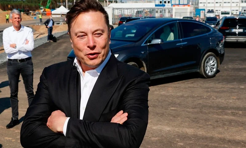 Tesla CEO Elon Musk talks to media as he arrives to visit the construction site of the future US electric car giant Tesla, on September 03, 2020 in Gruenheide near Berlin. - Tesla builds a compound at the site in Gruenheide in Brandenburg for its first European "Gigafactory" near Berlin. (Photo by Odd ANDERSEN / AFP) (Photo by ODD ANDERSEN/AFP via Getty Images)